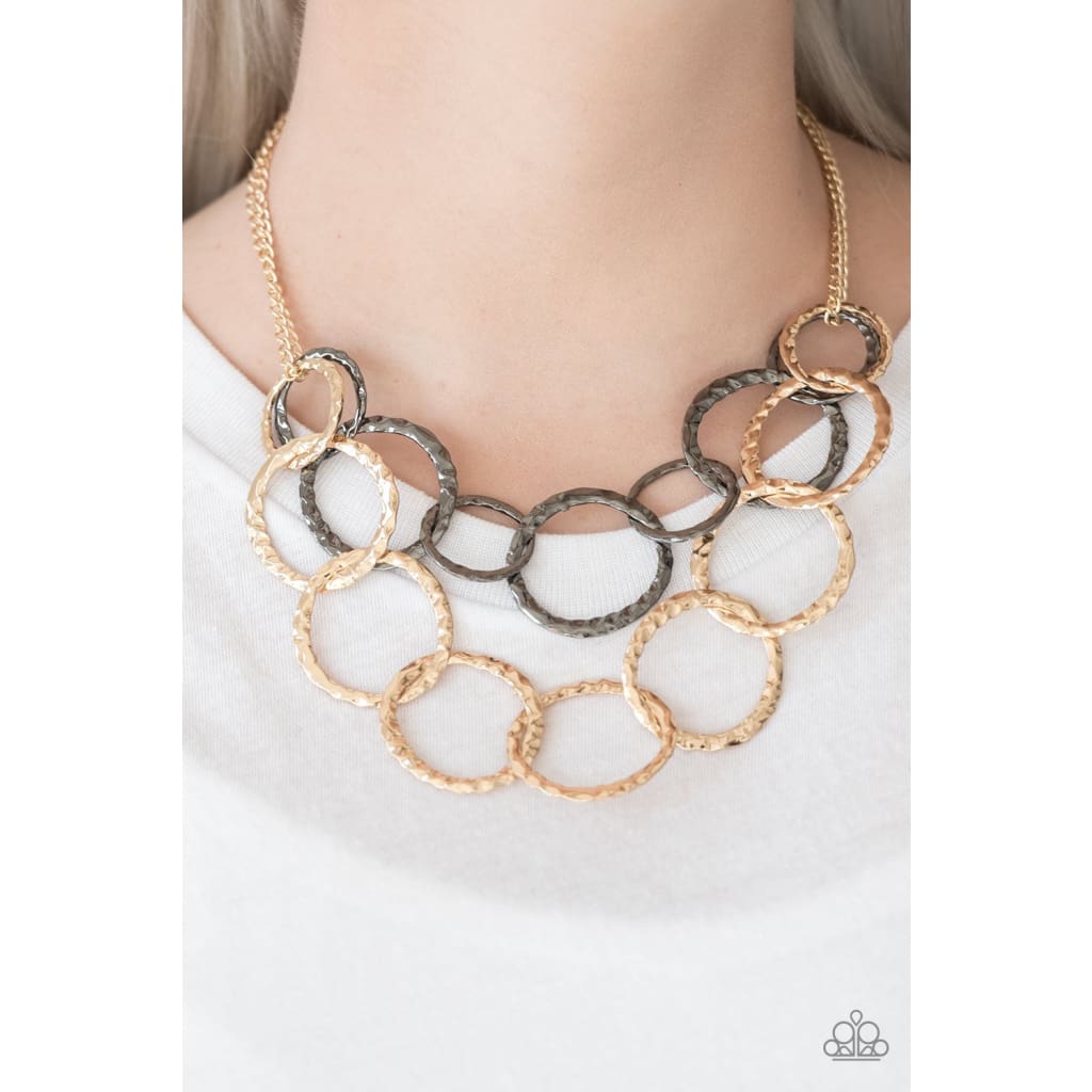 Paparazzi Radiant Ringmaster - Multicolor Necklace Gold and gunmetal rings with light catching shimmer. Sold as one individual multicolor necklace. Includes one pair of matching earrings. Paparazzi Accessories $5 dollar jewelry Paparazzi. Free shipping on orders over $75
