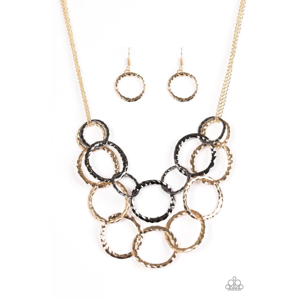 Paparazzi Radiant Ringmaster - Multicolor Necklace Gold and gunmetal rings with light catching shimmer. Sold as one individual multicolor necklace. Includes one pair of matching earrings. Paparazzi Accessories $5 dollar jewelry Paparazzi. Free shipping on orders over $75